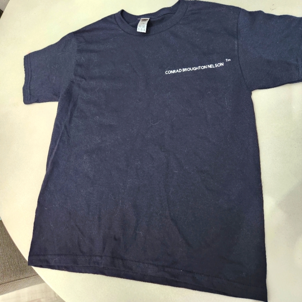 CONRAD BROUGHTON NELSON tm top